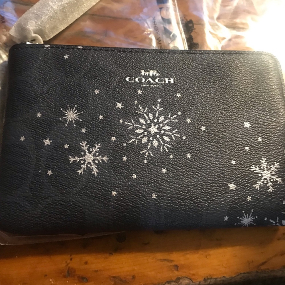 Coach Black Wristlet with White Snowflake Print